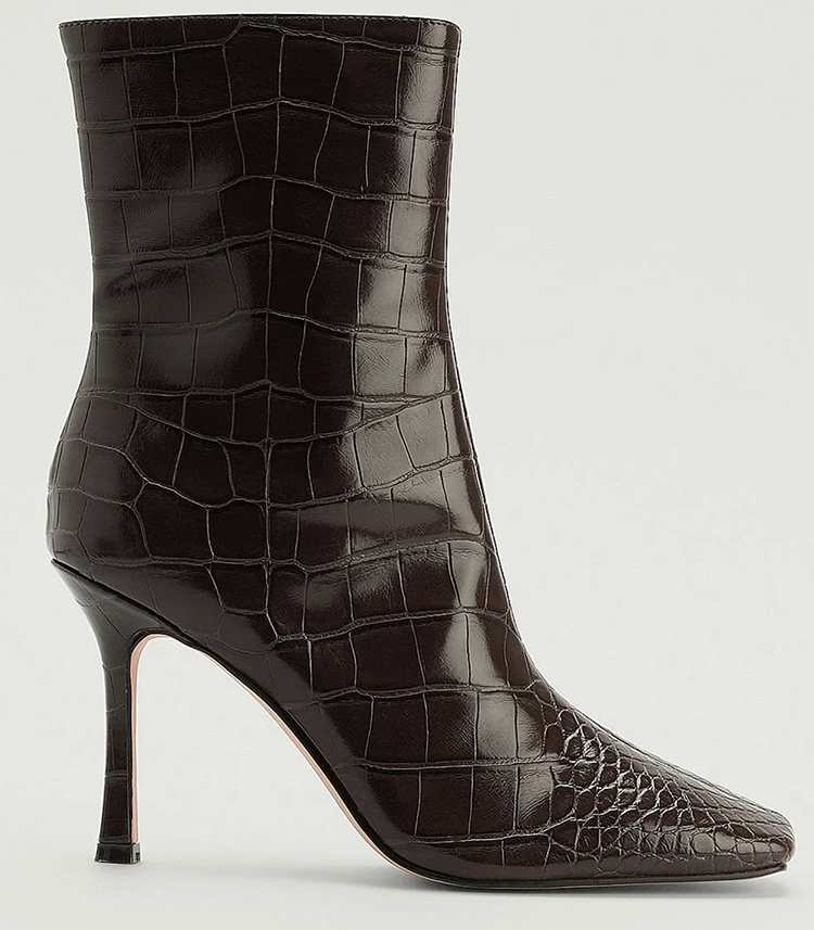 Elegante mørkebrune støvler med slangeskindstryk