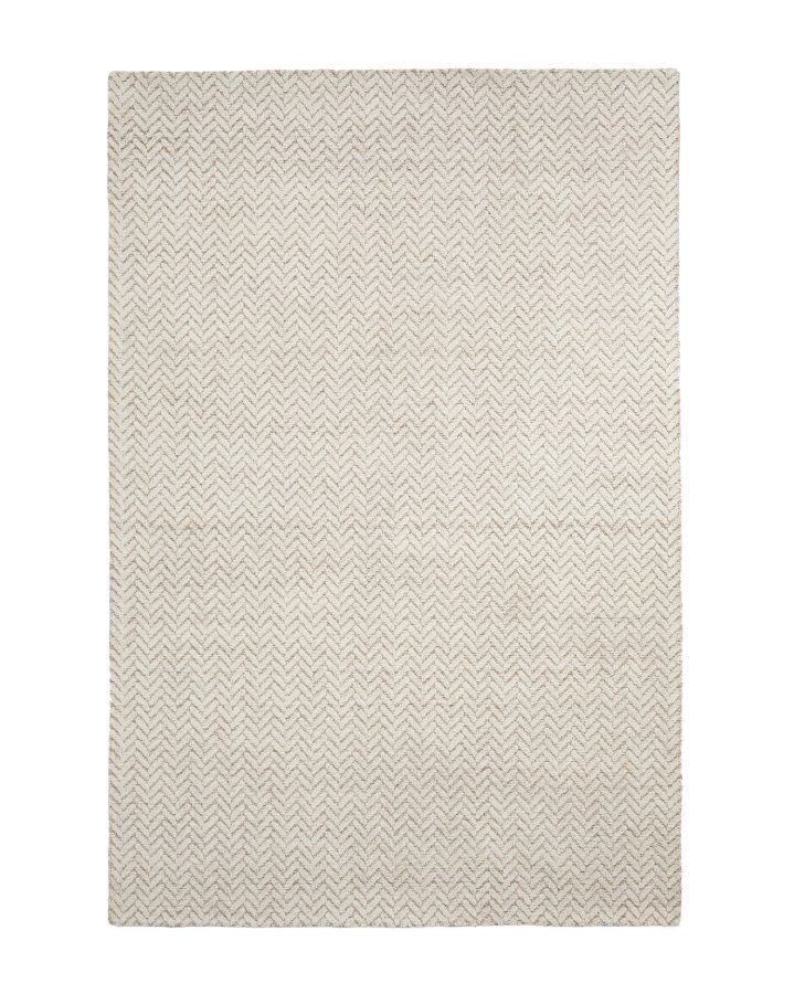 KAVE HOME Calira gulvtæppe i beige vævet jacquard