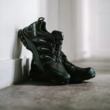 Salomon sneakers i moody editorial setting