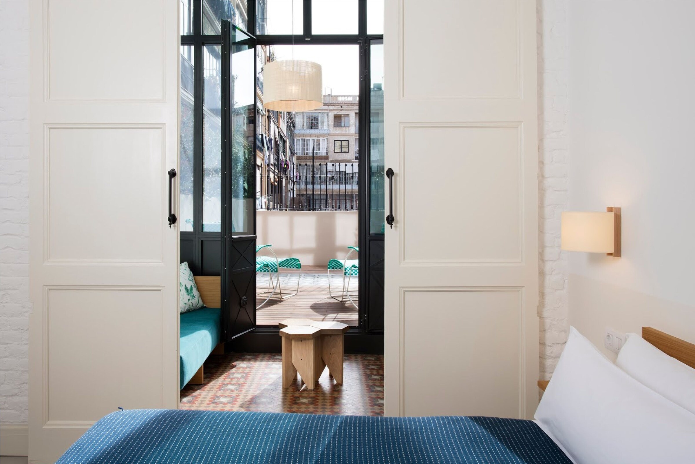 Værelse med premium sengetøj hos Hotel Casa Bonay & Spa i Barcelona
